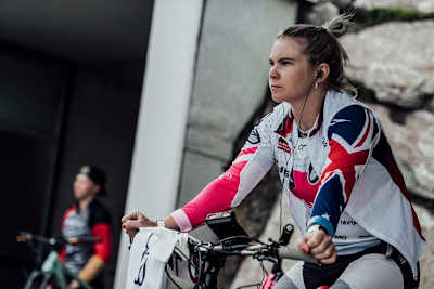 Tracey Hannah listens to music while warming up at Val di Sole.