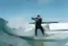 Julian Wilson narrowly avoids getting hit by the floating grind box while surfing at the URBNSURF wave pool in Melbourne during his The Rail Project.