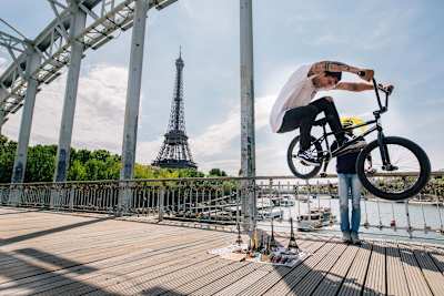 Local Paris resident Matthias Dandois bunny hops his BMX over some souvenirs in Paris, France.