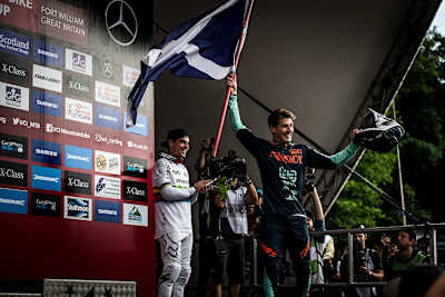 Reece Wilson on the winners presentation stage at the 2018 Fort William World Cup.