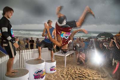 Italo Ferreira backflips off the podium after winning Red Bull Airborne on the Gold Coast