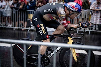 Wout van Aert speeding through the rain during the stage 1 time trial of the 109th Tour de France 2022 in Copenhagen, Denmark.