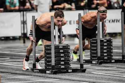 HYROX Elite 15 athlete Dylan Scott pushing the sleds