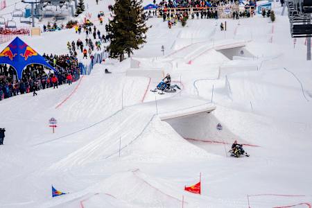 Racers tackle the first crossover feature at Red Bull Sledhammers.