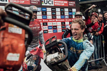 Martin Maes celebrates with a chainsaw during finals at Rd 7 of the UCI DH MTB World Cup 2018 in La Bresse, France on August 25, 2018.