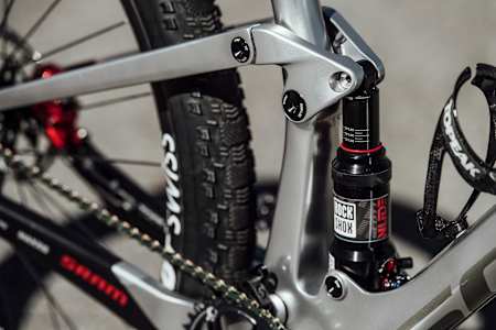 RockShox Nude RLC3 rear shock seen on Nino Schurter's bike.