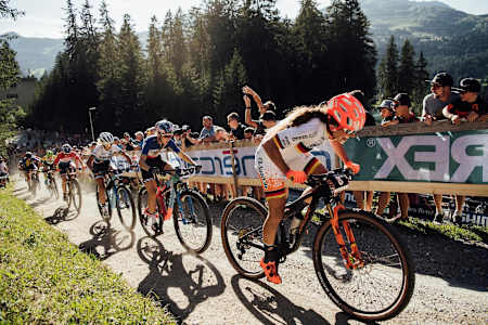 Elisabeth Brandau leads riders up climb during the XCC race at Rd 6 of the UCI MTB World Cup 2019 in Lenzerheide, Switzerland.