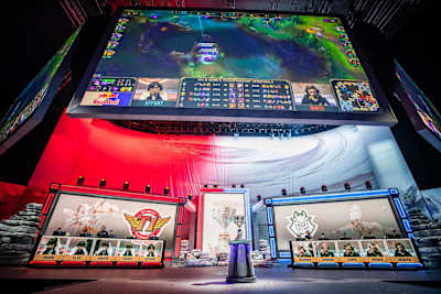 A photo of G2 Esports and SK Telecom T1 competing on-stage