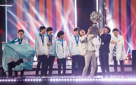 A photo of Damwon Gaming lifting the Summoners' Cup