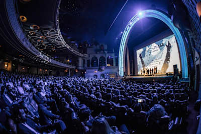 Travis Rice with cast and crew talks to the audience at "The Fourth Phase" premiere in Paris