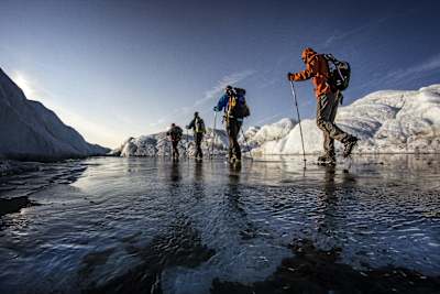 Petr Kraus and some friends walk on the ice cap in Greenland on Aug. 15, 2012.