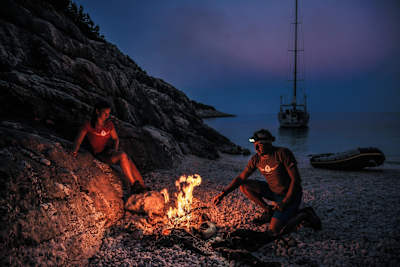 Daniela Bärnthaler and Christian Schiester running and sailing at the Ionian Sea in Greece on July 2016.