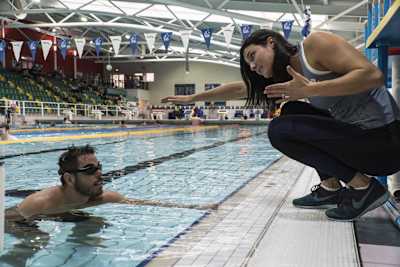 Keri-Anne Payne working with athlete Ross Edgley