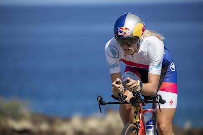 Close up of Lucy Charles riding her bike while training for IRONMAN.