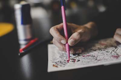 Close up of a competitor doing some colour work at Red Bull Doodle Art