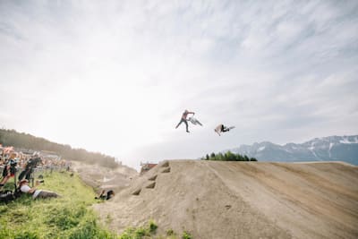 Competitors perform during slopestyle practice at Crankworx Innsbruck.