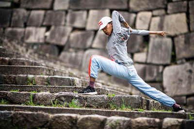 Angyil poses on stairs on Osaka.