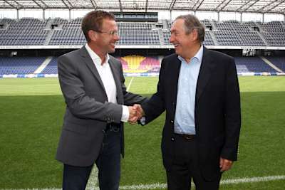 Sporting director Ralf Rangnick welcomes global sports director Red Bull soccer Gerard Houllier during his presentation in Salzburg, Austria on July 2, 2012,