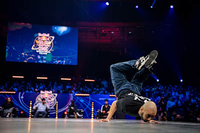 B-boy Tawfiq of the Netherlands competes at the Red Bull BC One b-boys World Final in the ERGO Arena in Gdansk, Poland on november 6, 2021