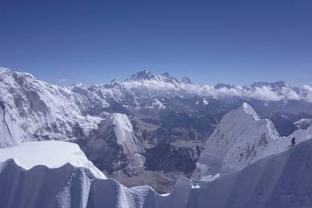 David Lama climbing the ridge up to the summit of Lunag Ri, Himalayas on October 25, 2018