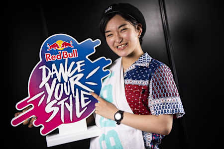 Maika with the winner's trophy at Red Bull Dance Your Style Japan 2018.