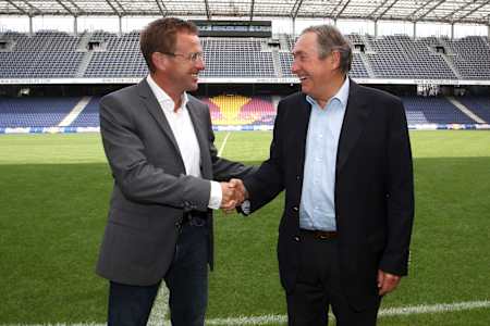 Sporting director Ralf Rangnick welcomes global sports director Red Bull soccer Gerard Houllier during his presentation in Salzburg, Austria on July 2, 2012,