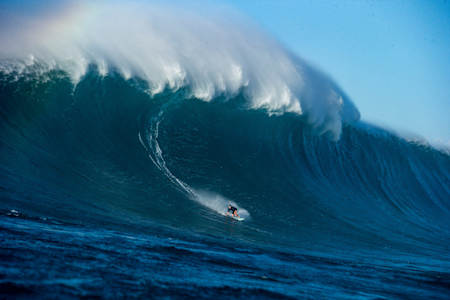 Ian Walsh surfing at home in Maui, Hawaii.
