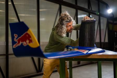 Andreas Podlipnik seen working on a prototype of the world's first wingsuit foil. 
