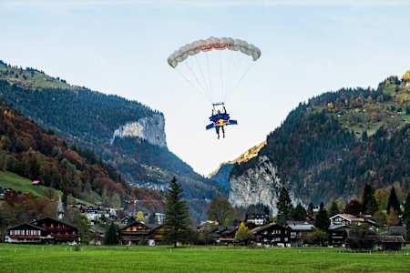 Wingsuit athlete Peter Salzmann pictured coming in to land after his first-ever foil wingsuit flight in Lauterbrunnen, Switzerland.