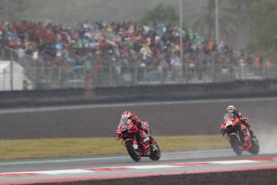 Ducati's Jack Miller is chased by Miguel Oliveira at the 2022 Indonesian MotoGP™.