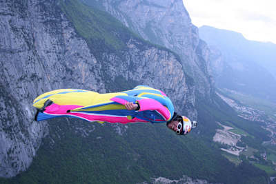 Pál Takáts flies in a custom-made wingsuit in crayon colors 