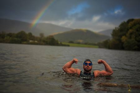 Ross Edgley swimming in open water in the UK.