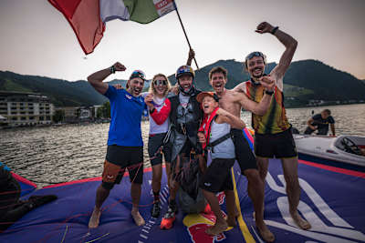 Aaron Durogati (ITA1) celebrates on the raft after the Red Bull X-Alps 2025 in Zell am See, Austria on June 22, 2025. 