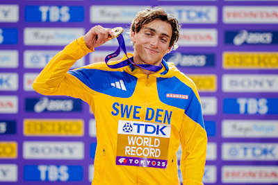 Armand Duplantis celebrates gold in men's pole vault at World Athletics Championships 2025 in Tokyo, Japan, setting a new world record and honouring Sweden's colours on the podium