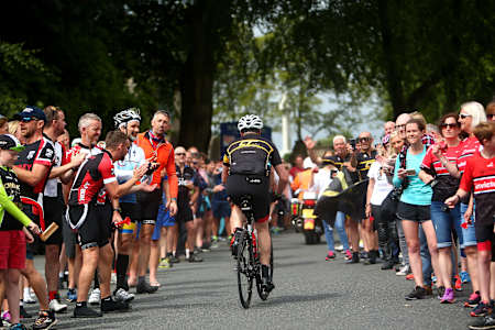 Crowd cheers a competitor at Ironman UK