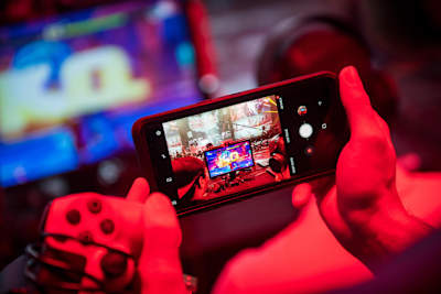Gamer looking at a phone