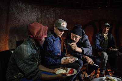 Rob Warner enjoys some local food in Lesotho