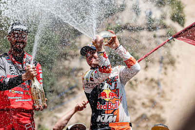 Dakar winner Matthias Walkner celebrates third place on his Red Bull Romaniacs debut.