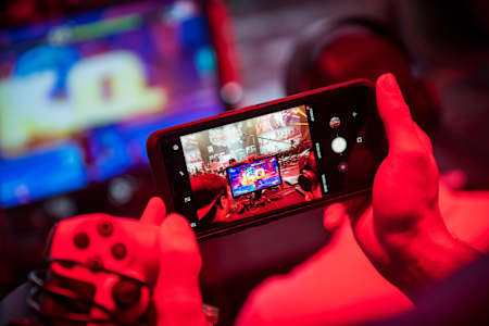 Gamer looking at a phone