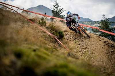 Aaron Gwin chooses his own wide line Gwin takes a turn on the downhill course in Vallnord in 2016.