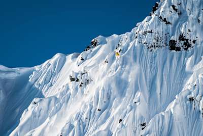 Helicopter pilot Mary Wilcock pulls off an incredible heli drop-off for Fabian Lentsch on an Alaskan spine.