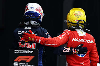 Lewis Hamilton and Max Verstappen congratulate each other in parc ferme after the F1 Grand Prix of Canada in May 2026.