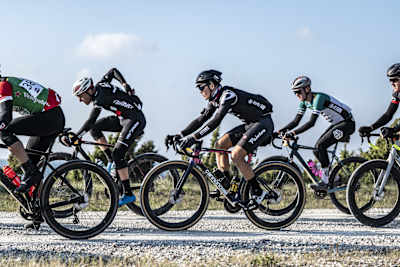 Pro cyclists on a gravel road as part of the Tour of Vikings in Saaremaa, Estonia on October 2, 2021.