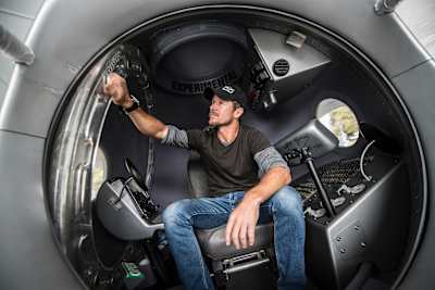 Felix Baumgartner visits his capsule at the 5th anniversary exhibition of the Red Bull Stratos mission at Red Bull Air Race World Championship at Indianapolis Motor Speedway, Indianapolis, USA.