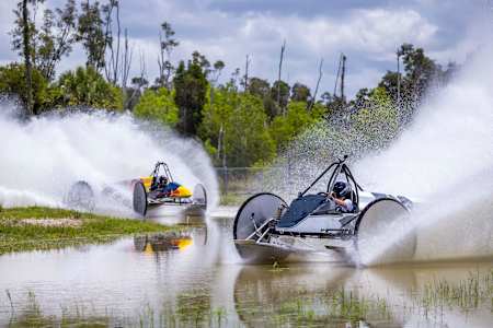 Max Verstappen races Yuki Tsunoda in the swamp buggy race finals