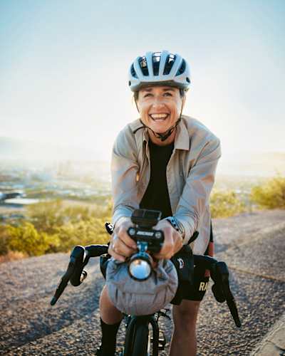 Even for hardcore riders, biking 160 miles in one day is huge. Wilcox aimed to do that more than 100 times in a row—and do it with a smile.