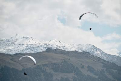 Thomas de Dorlodot and Horacio Llorens paraglide over the Himalayan mountains.