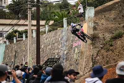 Tomas Slavik drops in during Red Bull Cerro Abajo watched on in close quarters by the urban MTB downhill fans