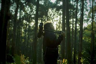 Japanese recording artist and RBMA graduate Yosi Horikawa looking for new field recordings on the island of Yakushima, Japan, in his new film Layered Memories