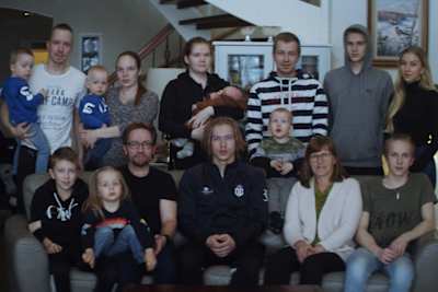 An image of Topson with his family.